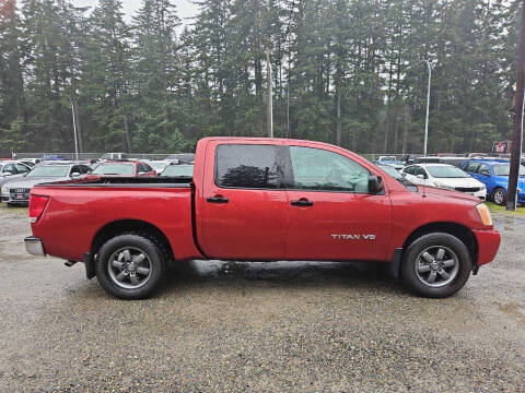 2014 Nissan Titan for sale at MC AUTO LLC in Spanaway WA