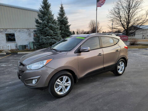 2013 Hyundai Tucson for sale at Ideal Auto Sales, Inc. in Waukesha WI