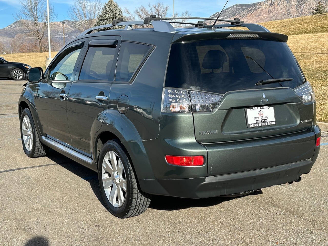 2009 Mitsubishi Outlander for sale at DRIVE N BUY AUTO SALES in OGDEN, UT