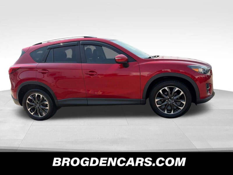 Used 2016 Mazda CX-5 Grand Touring with VIN JM3KE4DY3G0645275 for sale in Garden City, KS