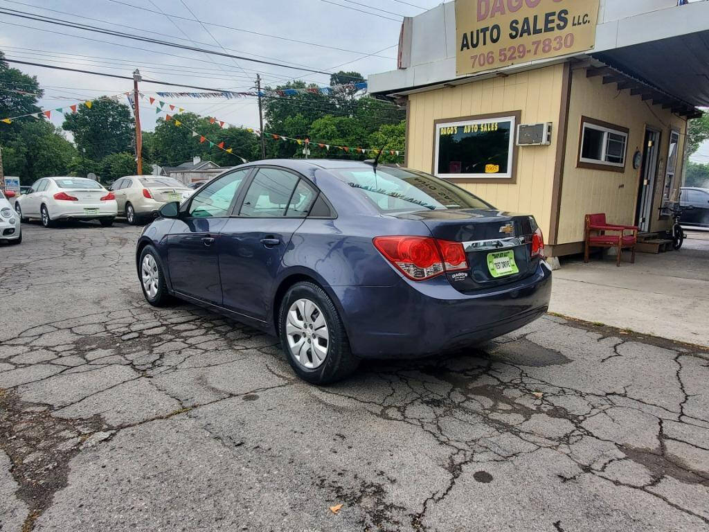 2014 Chevrolet Cruze for sale at DAGO'S AUTO SALES LLC in Dalton, GA