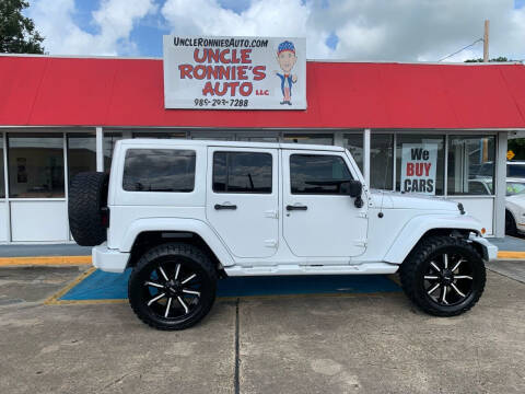 2013 Jeep Wrangler Unlimited for sale at Uncle Ronnie's Auto LLC in Houma LA