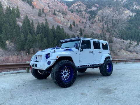 2016 Jeep Wrangler Unlimited for sale at PLANET AUTO SALES in Lindon UT