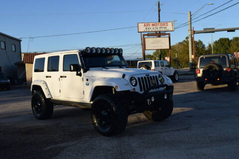 2015 Jeep Wrangler Unlimited for sale at ARI Motors in Houston TX