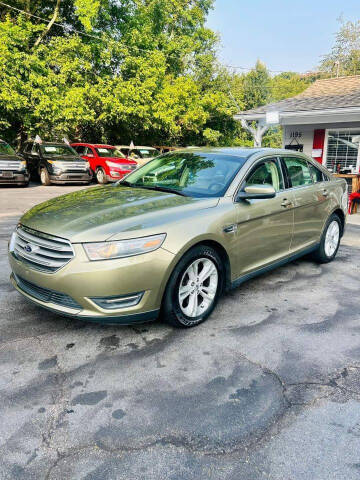 2013 Ford Taurus for sale at HERRERA AUTO SALES LLC in Sugar Hill GA