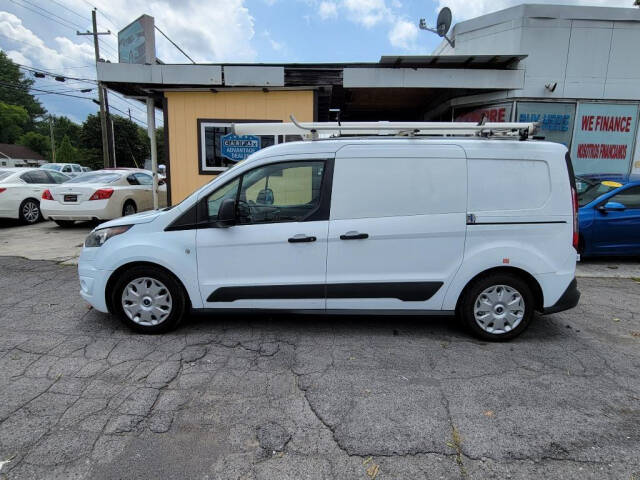 2016 Ford Transit Connect for sale at DAGO'S AUTO SALES LLC in Dalton, GA