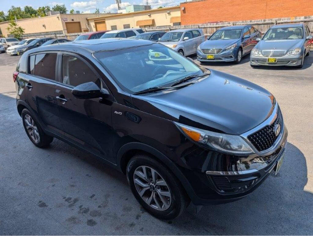 2014 Kia Sportage for sale at ENZO AUTO in Parma, OH