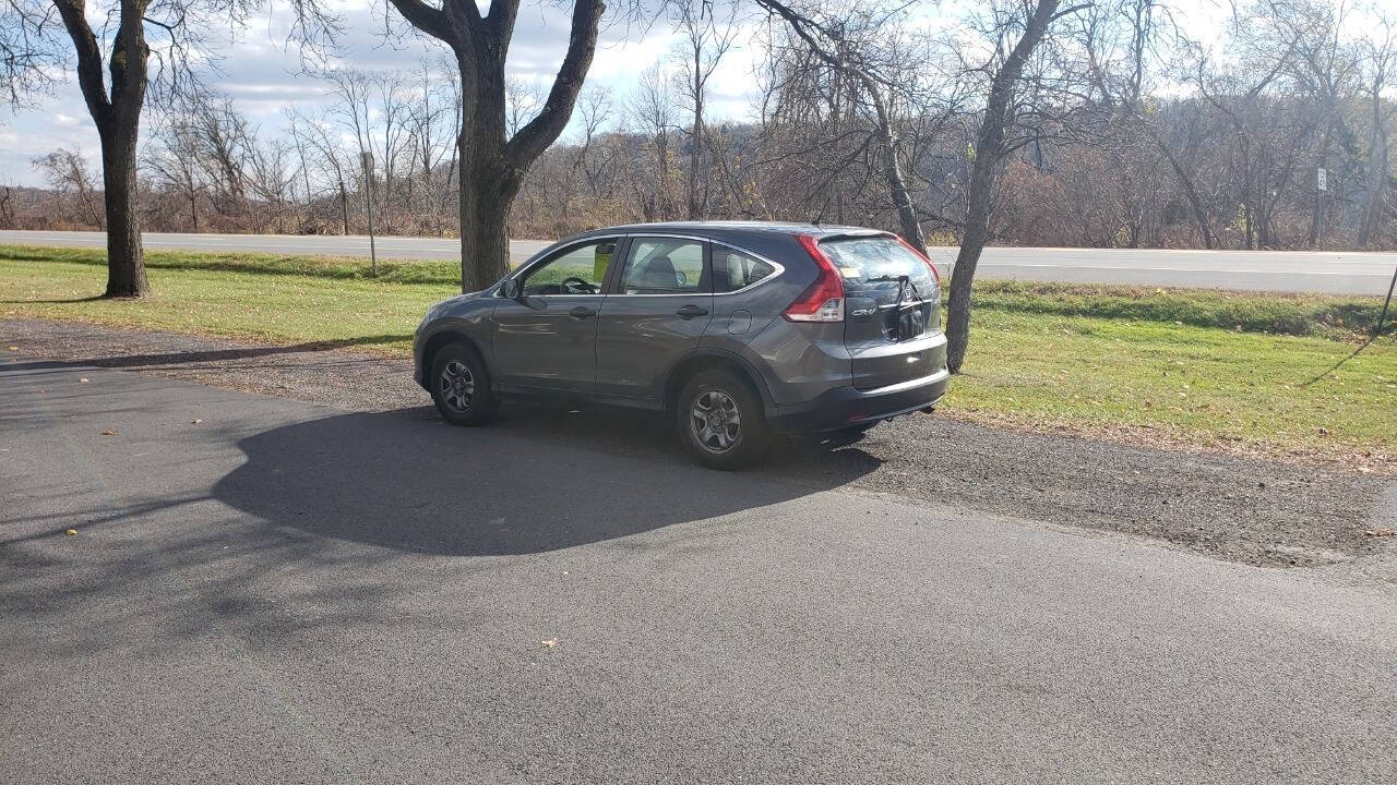 2013 Honda CR-V for sale at Family Motors, LTD. in Fort Johnson, NY