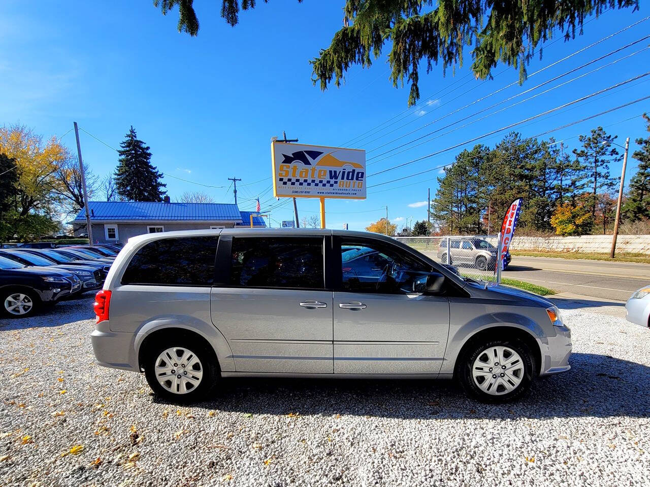 2014 Dodge Grand Caravan for sale at Statewide Auto LLC in Akron, OH