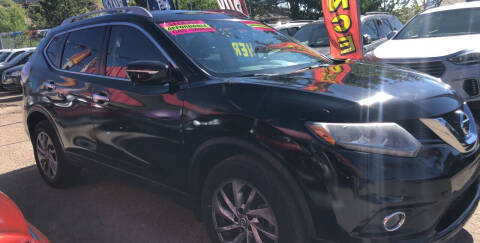 2015 Nissan Rogue for sale at Duke City Auto LLC in Gallup NM
