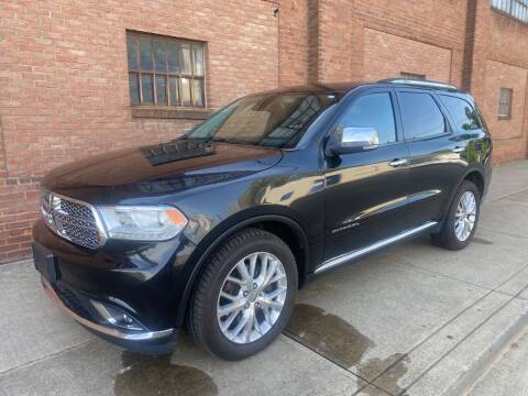 2014 Dodge Durango for sale at Domestic Travels Auto Sales in Cleveland OH