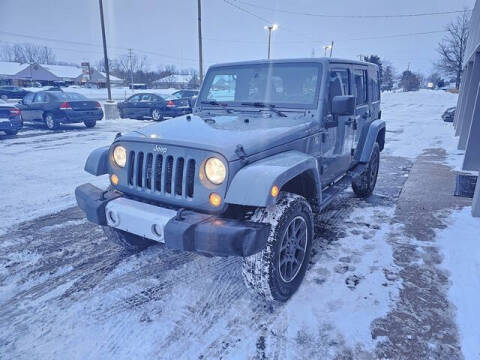 2015 Jeep Wrangler Unlimited for sale at Auto Max of GR in Comstock Park MI