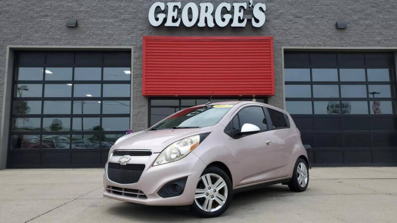 2013 Chevrolet Spark for sale at George's Used Cars in Brownstown MI