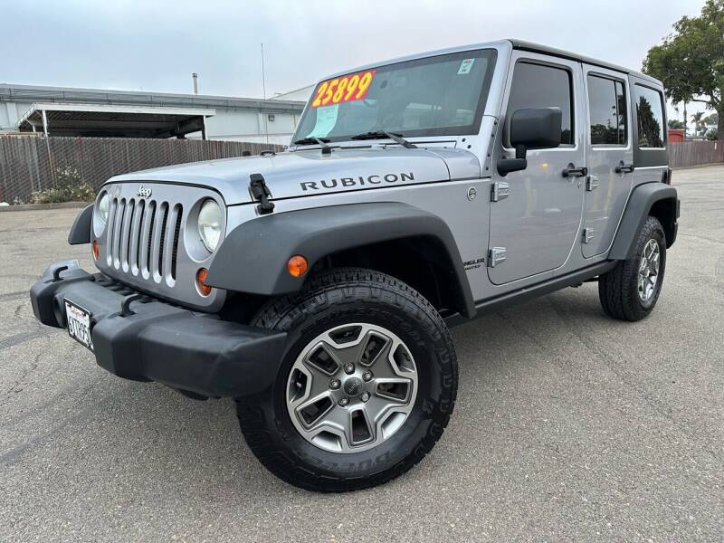 2013 Jeep Wrangler Unlimited for sale at San Diego Auto Solutions in Oceanside CA
