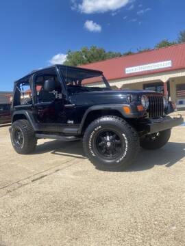 1997 Jeep Wrangler for sale at PITTMAN MOTOR CO in Lindale TX