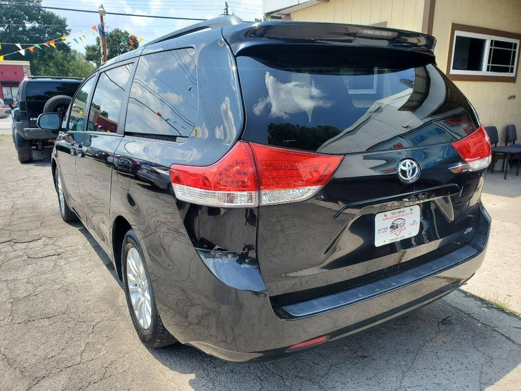 2013 Toyota Sienna for sale at DAGO'S AUTO SALES LLC in Dalton, GA