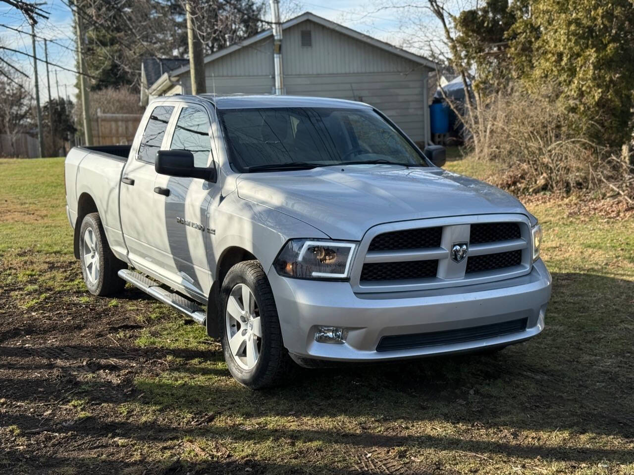 2012 RAM 1500 Express 4x4 4dr Quad Cab 6.3 ft. SB Pickup's photo