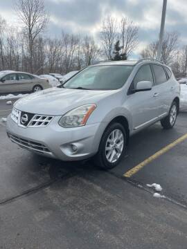 2011 Nissan Rogue for sale at Suburban Auto Sales LLC in Madison Heights MI