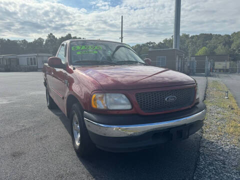 2001 Ford F-150 for sale at Cars for Less in Phenix City AL