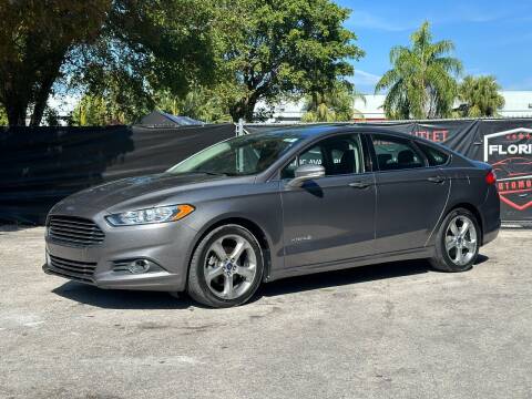2014 Ford Fusion Hybrid for sale at Florida Automobile Outlet in Miami FL