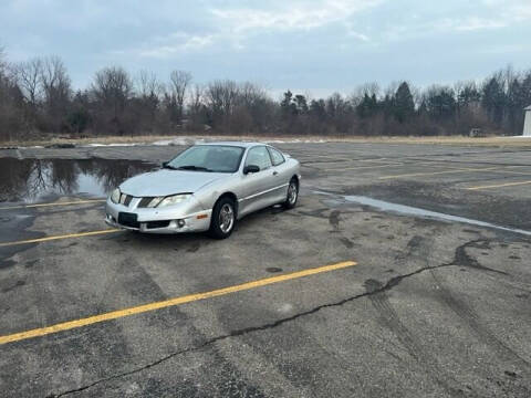 2004 Pontiac Sunfire for sale at Caruzin Motors in Flint MI
