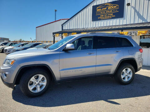 2015 Jeep Grand Cherokee for sale at BELOW BOOK AUTO SALES in Idaho Falls ID