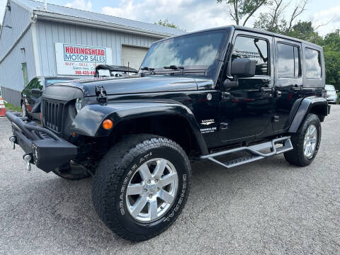 2007 Jeep Wrangler Unlimited for sale at HOLLINGSHEAD MOTOR SALES in Cambridge OH