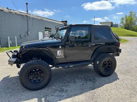 2013 Jeep Wrangler for sale at Starrs Used Cars Inc in Barnesville OH