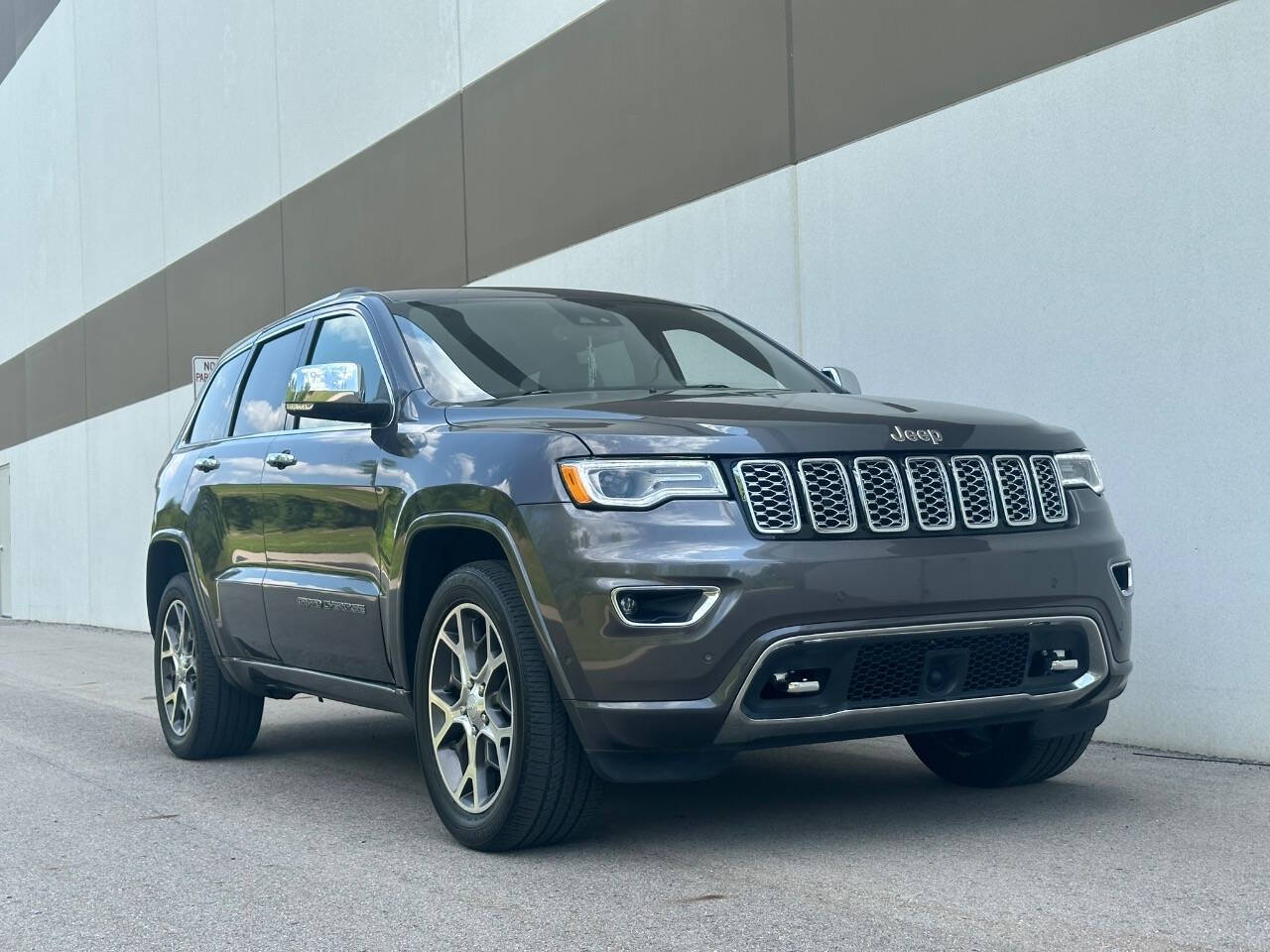 2019 Jeep Grand Cherokee for sale at Phoenix Motor Co in Romulus, MI