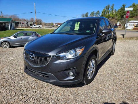 2014 Mazda CX-5 for sale at Daves Supreme Auto Sales LLC in Gallipolis OH