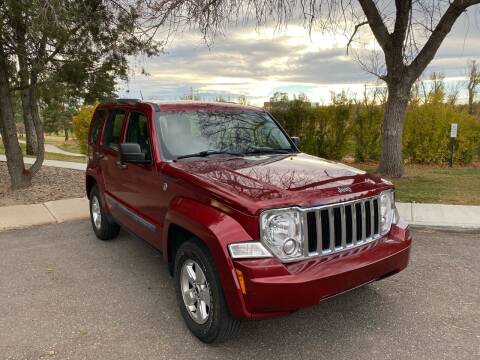 2012 Jeep Liberty for sale at QUEST MOTORS in Englewood CO