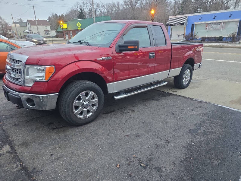 2013 Ford F-150 for sale at Maximum Auto Group II INC in Cortland OH