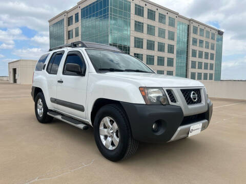2013 Nissan Xterra for sale at Signature Autos in Austin TX