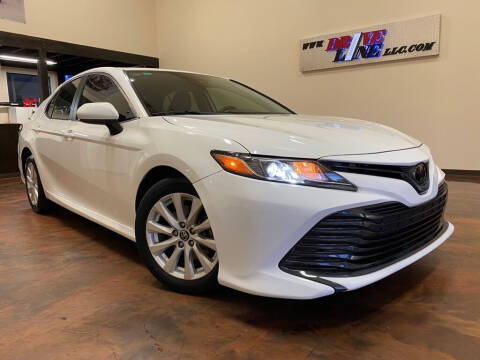 2019 Toyota Camry for sale at Driveline LLC in Jacksonville FL