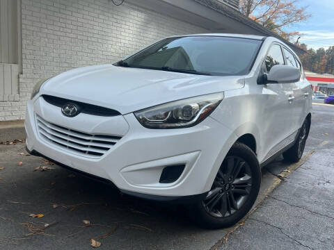 2015 Hyundai Tucson for sale at El Camino Auto Sales - Roswell in Roswell GA