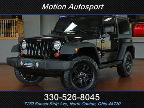 2012 Jeep Wrangler for sale at Motion Auto Sport in North Canton OH