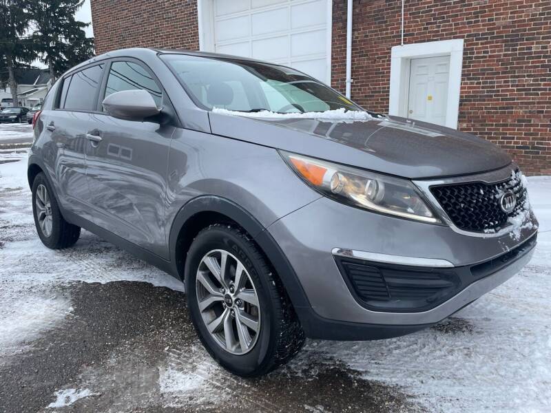 2016 Kia Sportage for sale at Jim's Hometown Auto Sales LLC in Byesville OH