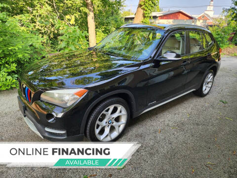 2014 BMW X1 for sale at Car and Truck Exchange, Inc. in Rowley MA