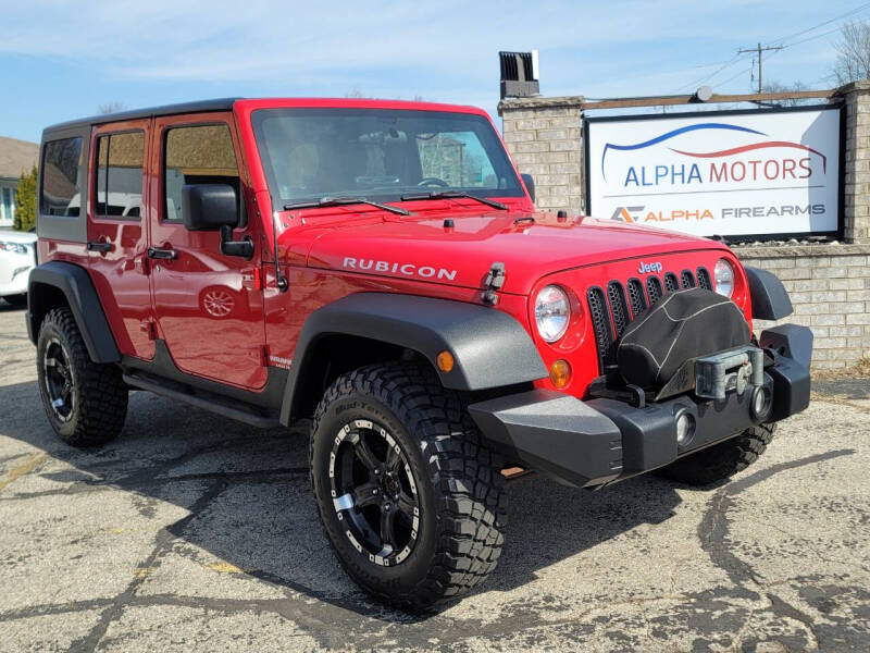 2012 Jeep Wrangler Unlimited for sale at Alpha Motors in New Berlin WI