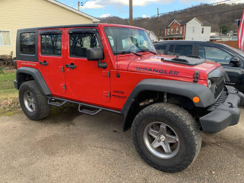 2014 Jeep Wrangler Unlimited for sale at MYERS PRE OWNED AUTOS & POWERSPORTS in Paden City WV