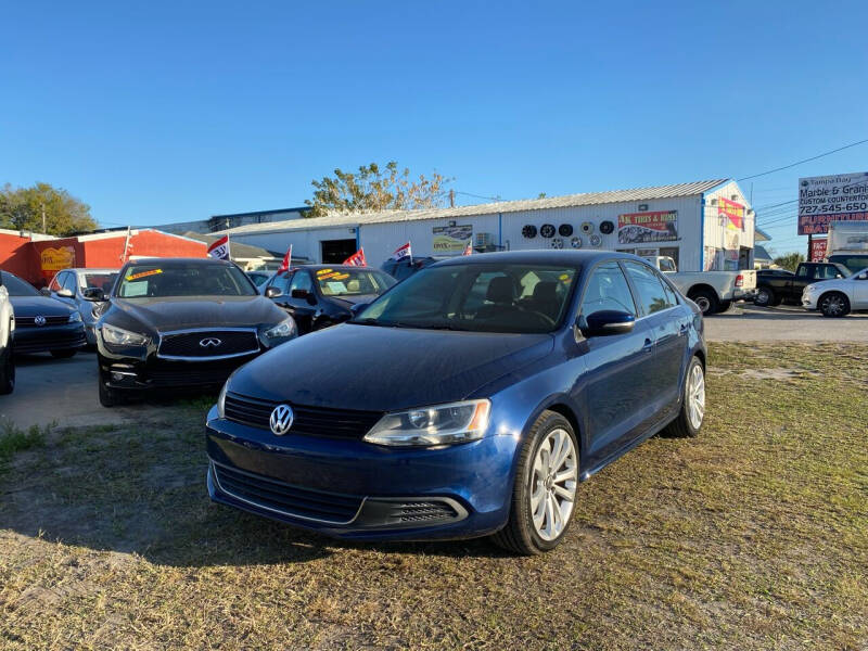 2014 Volkswagen Jetta for sale at ONYX AUTOMOTIVE, LLC in Largo FL