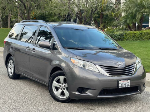 2015 Toyota Sienna for sale at MILLENNIUM MOTORS in Van Nuys CA