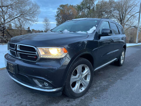 2014 Dodge Durango for sale at BELOW BOOK AUTO SALES in Idaho Falls ID