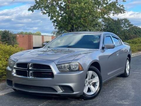 2014 Dodge Charger for sale at William D Auto Sales in Norcross GA