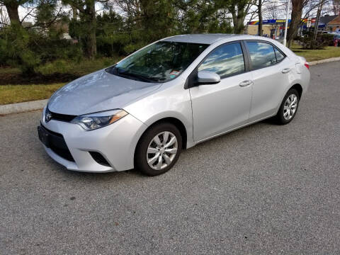 2014 Toyota Corolla for sale at Plum Auto Works Inc in Newburyport MA