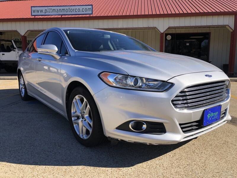 2013 Ford Fusion for sale at PITTMAN MOTOR CO in Lindale TX