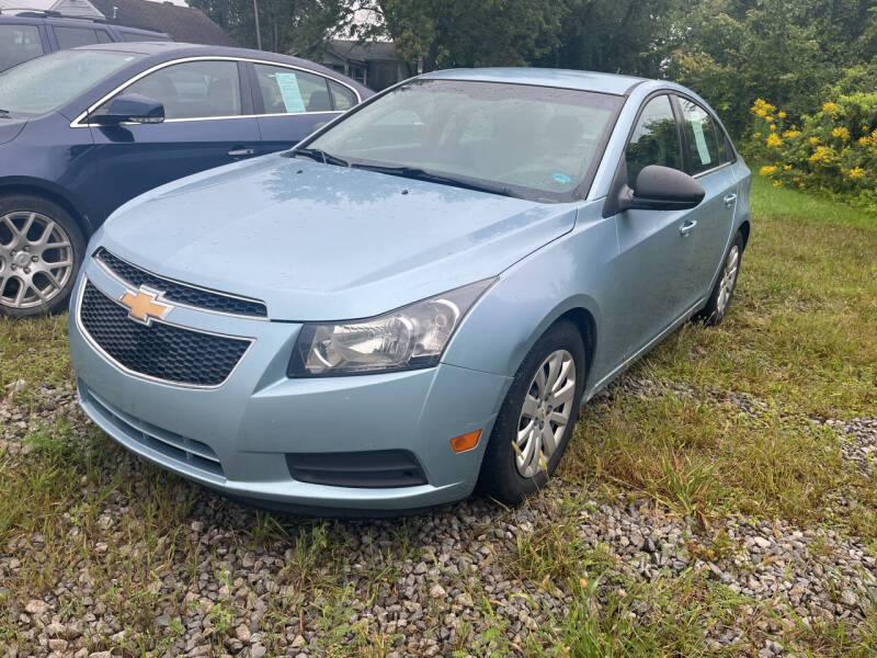 2011 Chevrolet Cruze for sale at HEDGES USED CARS in Carleton MI