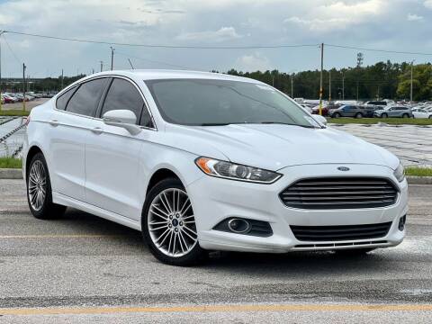 2013 Ford Fusion for sale at EASYCAR GROUP in Orlando FL