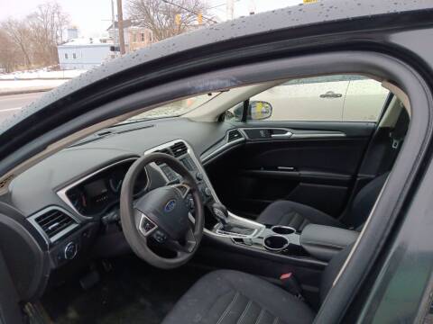 2013 Ford Fusion for sale at Sarchione INC in Alliance OH