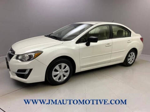 2016 Subaru Impreza for sale at J & M Automotive in Naugatuck CT